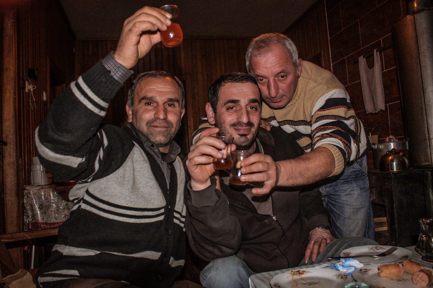 Drinks with the men of the village, Makho, Republic of Georgia